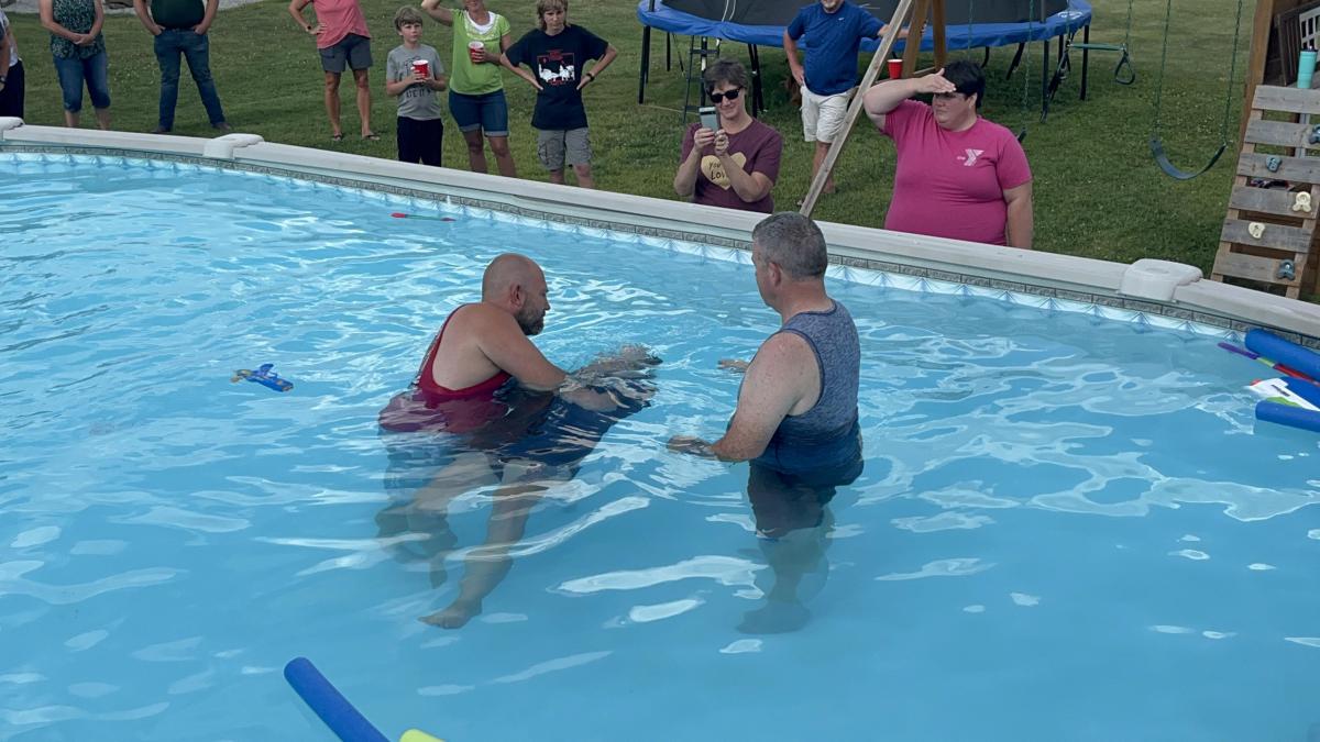 Jamey baptizing Lacy.jpg